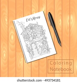 Spiral bound notepad or coloring book with coloring page picture, house with cat. Vector template or mock up. Easy to place your image on the cover.Top view.