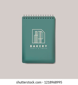 Spiral green notebook mockup isolated vector