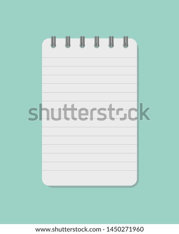 spiral notebook isolated on green background.