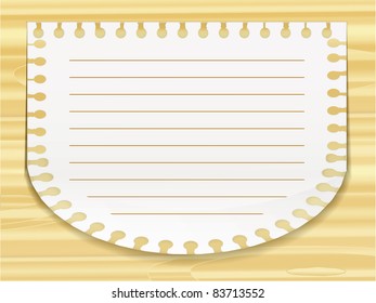 Spiral notepad sheet on wood background