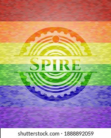 Spire emblem on mosaic background with the colors of the LGBT flag. 