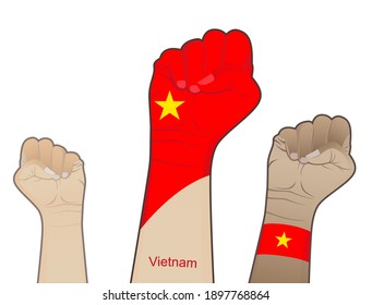 The spirit of struggle by lifting the hand with the Vietnamese flag