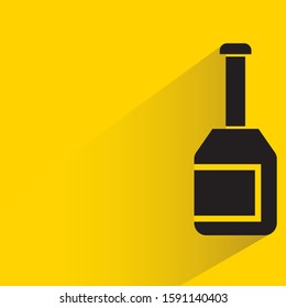 spirits, wine and beer bottle with drop shadow in yellow background