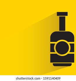 spirits, wine and beer bottle with drop shadow in yellow background
