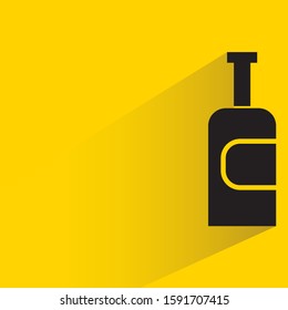 spirits, wine and beer bottle with drop shadow in yellow background