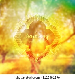 Spiritual illustration with inspirational phrase; Sacred geometry on blurred background with forest; Motifs of lotus, flower of life and yantra; Poster for yoga studio.