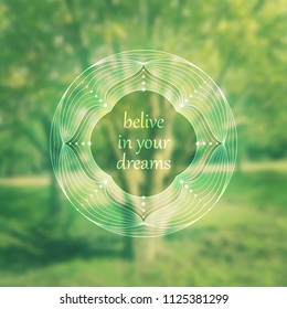 Spiritual illustration with inspirational phrase; Sacred geometry on blurred background with forest; Motifs of lotus, flower of life and yantra; Poster for yoga studio.