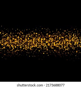splash gold glitter stardust trail on black background.