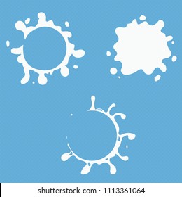 Splash of milk set on a blue background. View from above. High resolution