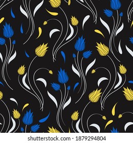 splashes, yellow and blue abstract flowers with light gray stems and leaves are randomly arranged on a black background. cute floral seamless pattern. vector