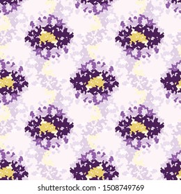 Splatter hand painted dye polka dot background. Seamless pattern wax print bleached resist. Purple lilac retro dyed batik textile. Variegated bright seventies textured floral trendy fashion all over.