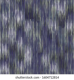 Spliced vector camouflage stripe texture. Variegated mottled background. Seamless camouflage pattern. Modern distorted masculine textile all over print.  Green bleed fashion disrupted glitch repeat.