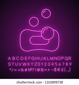 Sponge with bubbles neon light icon. Spa salon. Glowing sign with alphabet, numbers and symbols. Vector isolated illustration