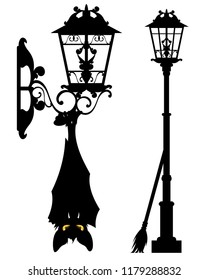 spooky bat hanging on streetlight - halloween city life vector silhouette decor set