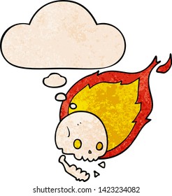 spooky cartoon flaming skull with thought bubble in grunge texture style