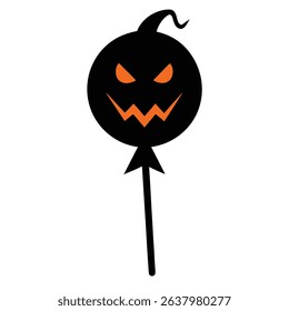 Spooky halloween jack o lantern lollipop treat.