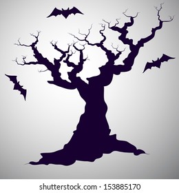 Spooky hand drawn tree silhouette with cartoon bats.