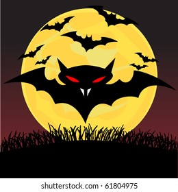 Spooky looking black bats with red eyes under the moonlight