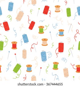 Spools of thread and sewing needles seamless pattern