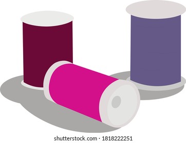 Spools of thread in various sizes and colors scattered on the surface.