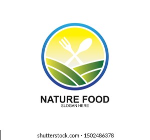 spoon and fork above green land field for food restaurant cafe eatery vector logo design template