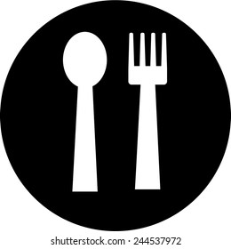 spoon and fork icon on black dish