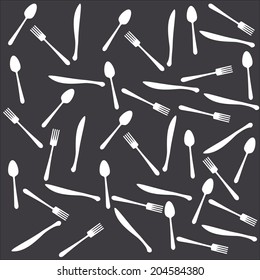 Spoon, fork and knife on the black background  |  texture for menu