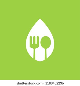 Spoon and fork logo in a leaf vector