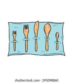 spoon and fork on napkin