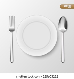 Spoon, fork and plate isolated on white background