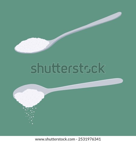 Spoon with sugar or salt pouring from spoon