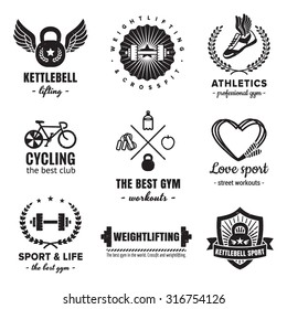 Conjunto vectorial vintage de logotipos deportivos y de fitness. Hipster y estilo retro. Perfecto para el diseño de su empresa.