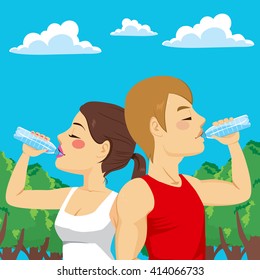Sport man and woman couple drinking from water bottle