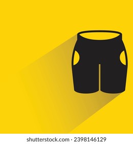 sport pants icon with shadow on yellow background