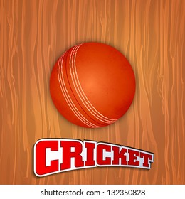 Sports concept with shiny red ball and text cricket on wooden background.