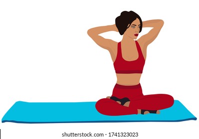 Sports girl in a red suit is engaged in fitness and yoga