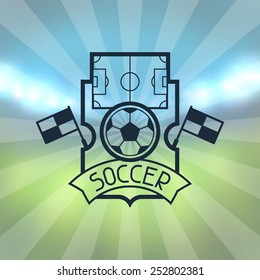 Sports label with soccer symbols on blurred stadium background.