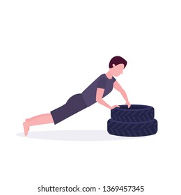 sports man doing push-up exercise on tires bodybuilder working out in gym hard training healthy lifestyle concept flat white background
