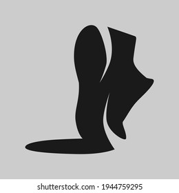 Sports running shoe symbol on gray backdrop. Design element