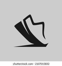 Sports running shoe symbol on gray backdrop. Design element