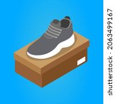 Sports sneaker stands on top of a cardboard box.