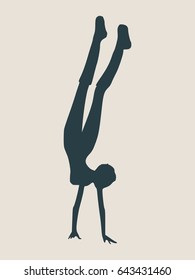 Sporty beautiful young woman working out, doing handstand. Vector silhouette illustration isolated on grey background. Yoga and fitness training theme