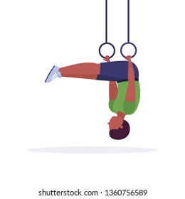 sporty man doing ring dips exercises with gymnastic rings african american guy training in gym cardio crossfit workout healthy lifestyle concept flat white background full length