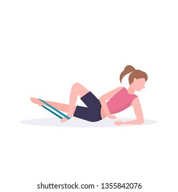 sporty woman doing exercises with resistance band girl training in gym stretching workout healthy lifestyle concept flat white background