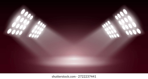 Feixes de holofote iluminam o palco vazio.
