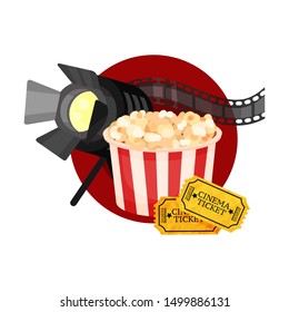 Spotlight, film strip, popcorn and tickets in a red circle. Vector illustration on a white background.