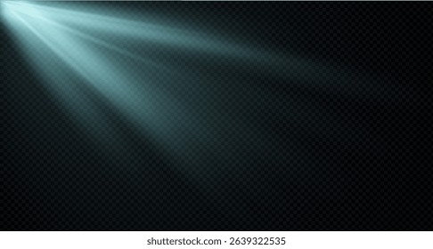 Spotlight on the stage or divine particle rays isolated on a black transparent background. The glow of the rays