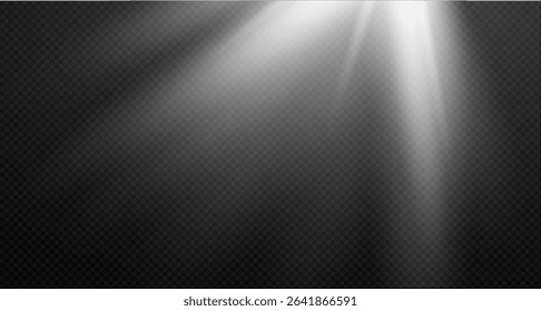 Spotlight on the stage or divine particle rays isolated on a black transparent background. The glow of the rays