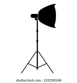Spotlight on tripod Light projector Softbox on tripod Tripod light Equipment for professional photography Theater light icon black color vector illustration flat style simple image