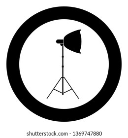 Spotlight on tripod Light projector Softbox on tripod Tripod light Equipment for professional photography Theater light icon in circle round black color vector illustration flat style simple image